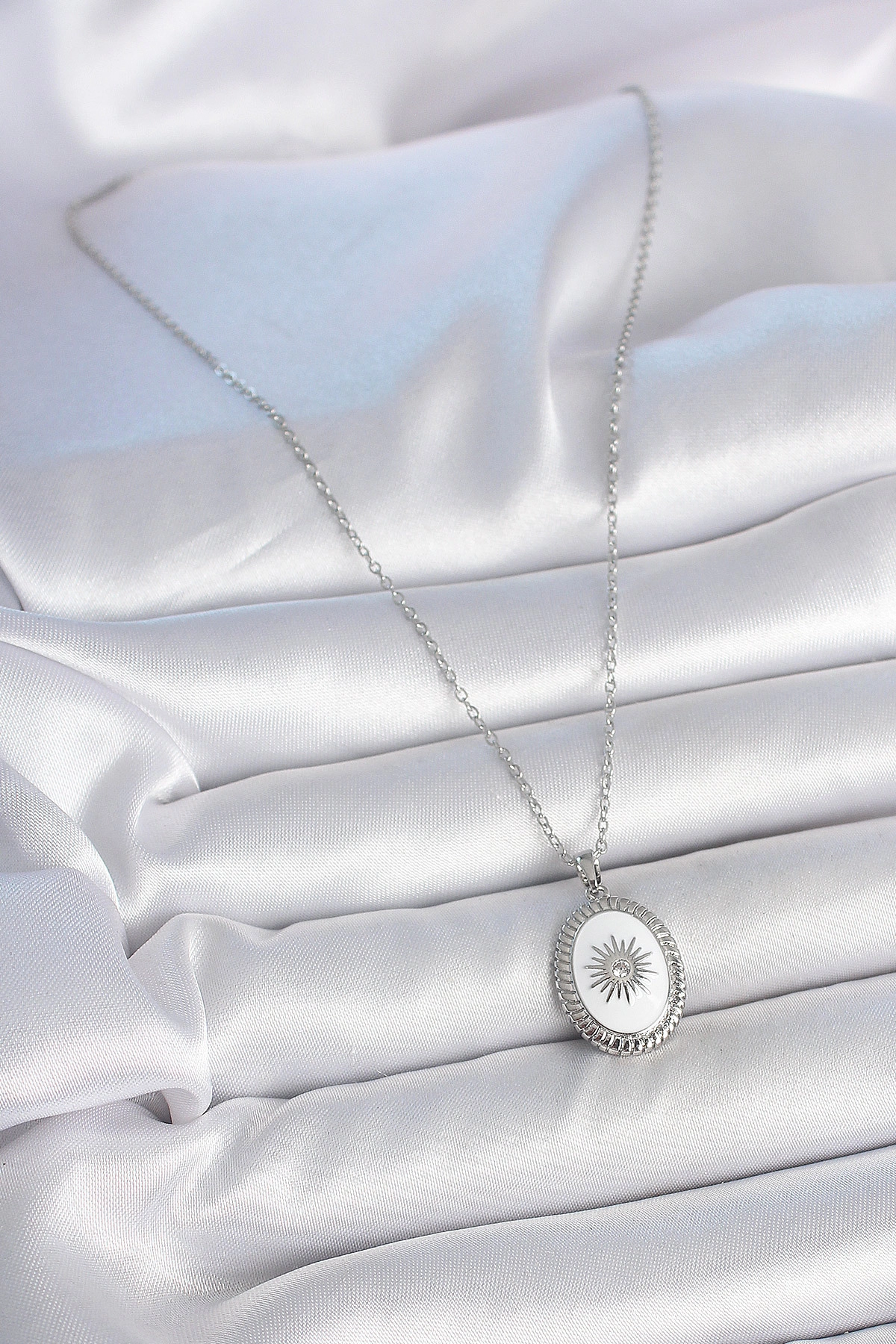 316L Çelik Gümüş Renk Beyaz Mineli Güneş İşlemeli Nazar Boncuk Detay Madalyon Model Kadın Kolye-1