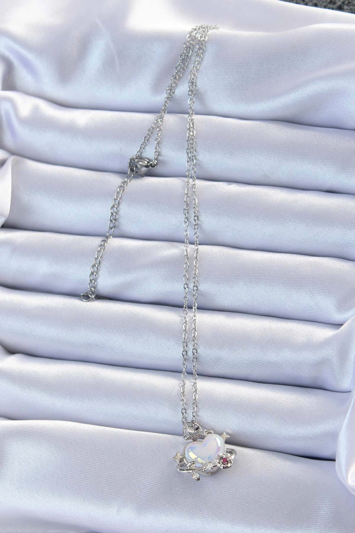 316L Çelik Zincir Gümüş Renk Zirkon Taşlı Gezegen Görünümlü Kalp Kolye-1