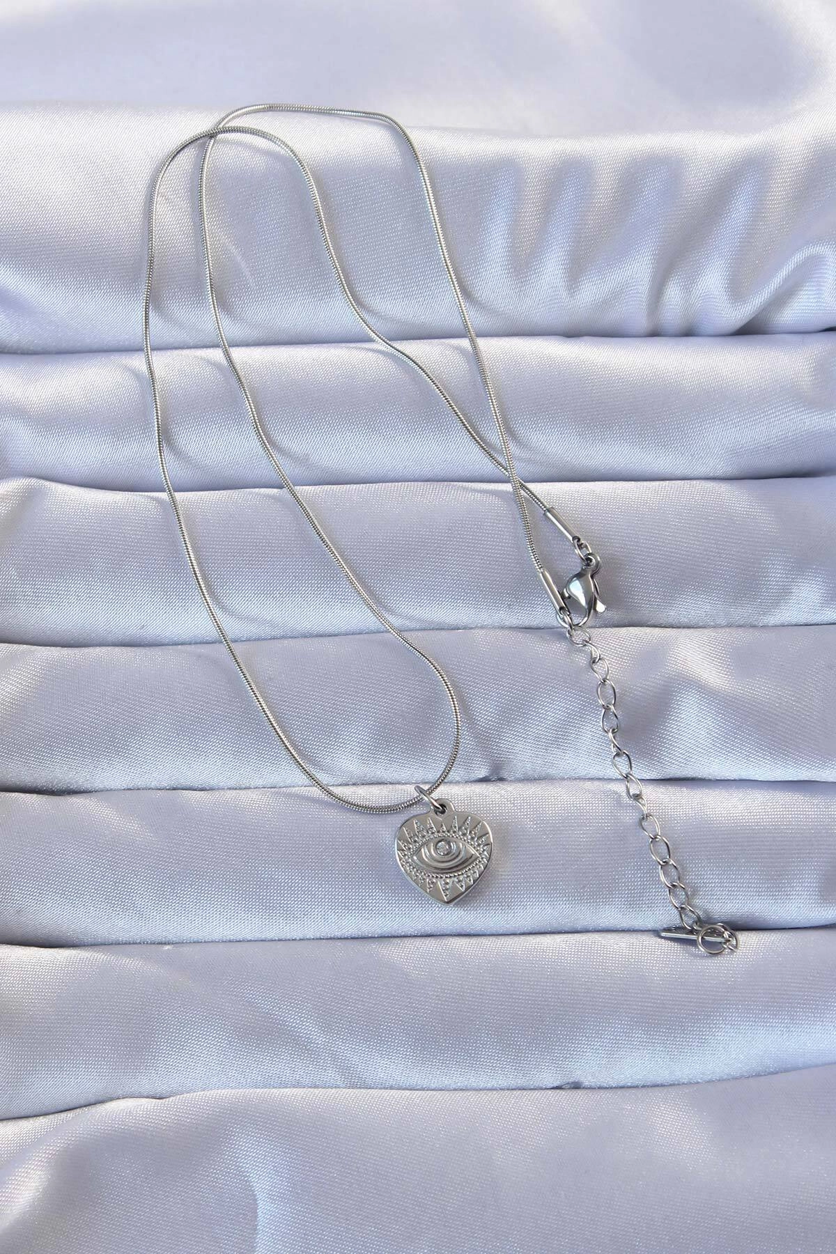 316L Gümüş Renk Zirkon Taşlı İşlemeli Göz Detay Kalp Kolye-1