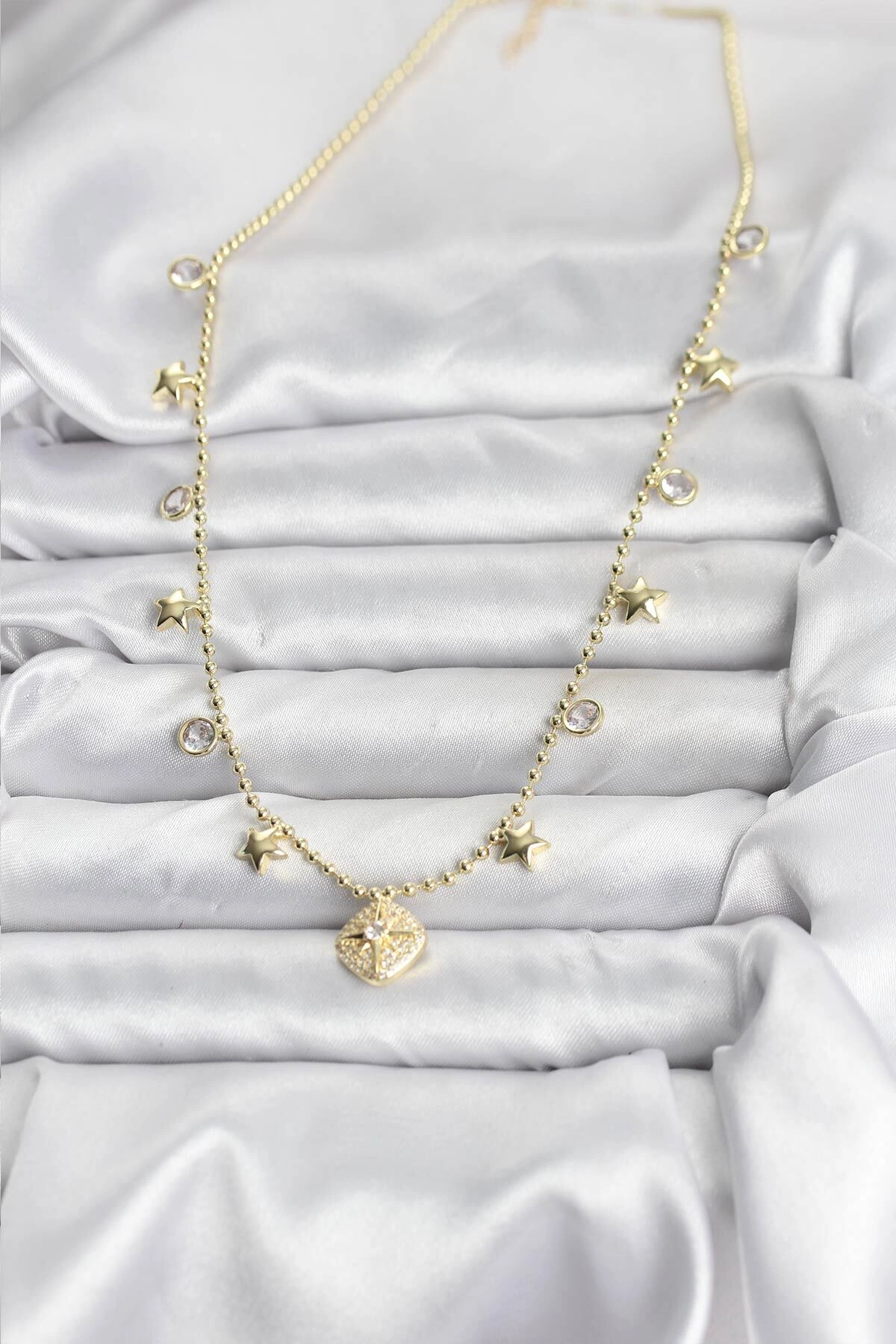 Pirinç Gold Renk Zirkon Taşlı Kutup Yıldızı Model Kadın Kolye-1