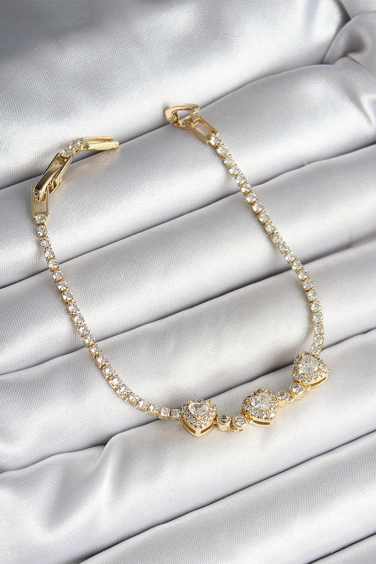 Pirinç Sıralı Kalp Figürlü Zirkon Taşlı Gold Renk Kadın Bileklik-0