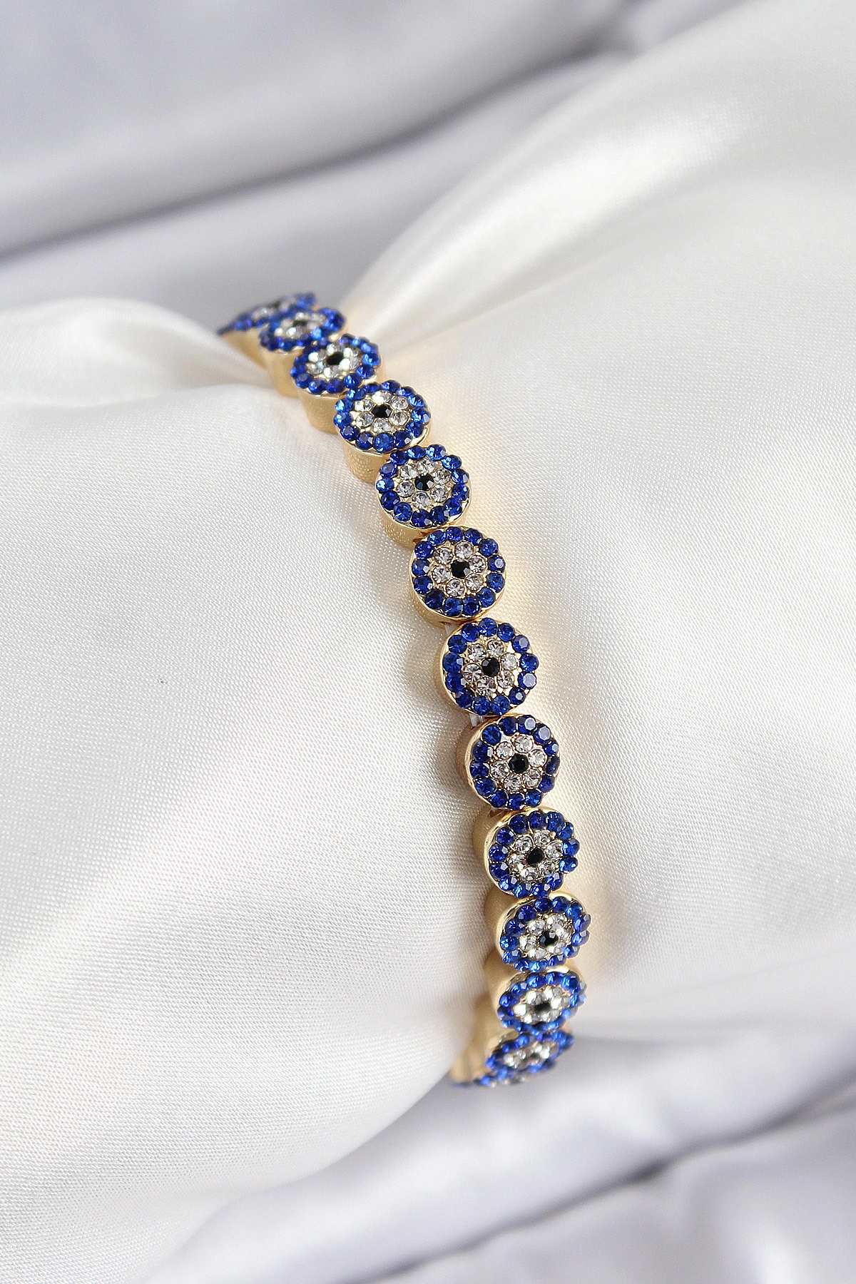 Pirinç Zirkon Taşlı Lacivert Nazar Model Gold Renk Lastikli Kadın Bileklik-0