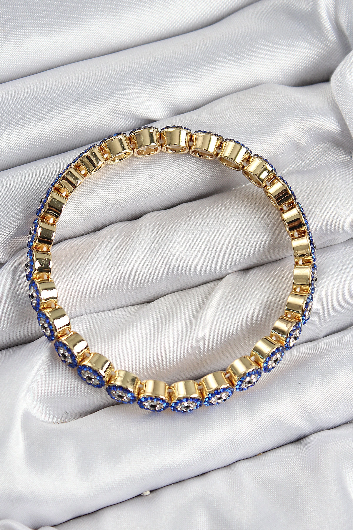 Pirinç Zirkon Taşlı Lacivert Nazar Model Gold Renk Lastikli Kadın Bileklik-1