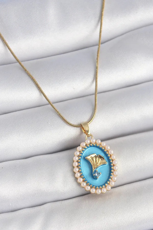 316L Çelik Gold Renk Zincir Mavi Mineli İncili Zirkon Taşlı Çiçek İşlemeli Portre Model Kadın Kolye