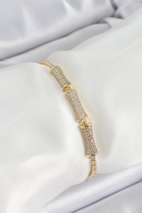 Pirinç Gold Renk Zirkon Taşlı Kemik Model Kadın Bileklik