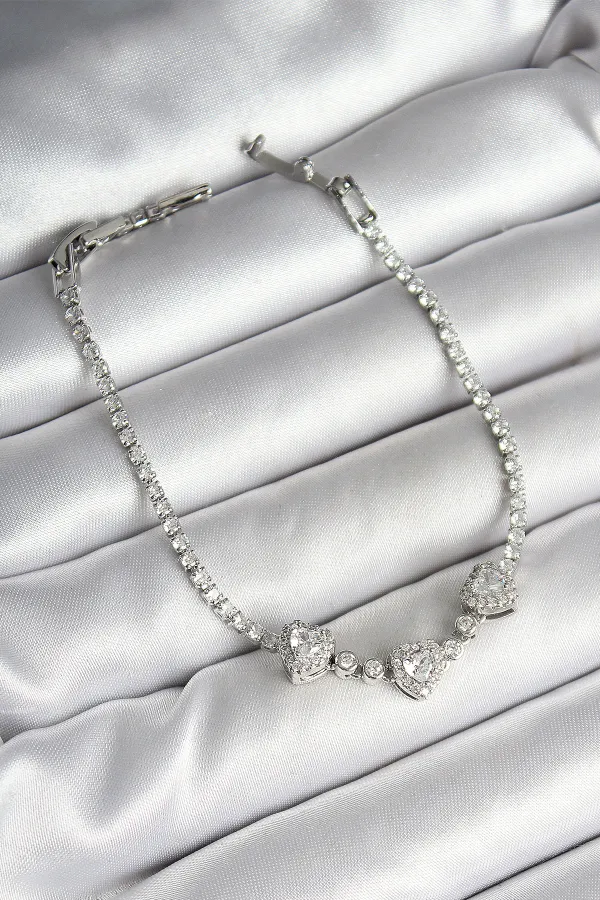 Pirinç Sıralı Kalp Figürlü Zirkon Taşlı Gümüş Renk Kadın Bileklik