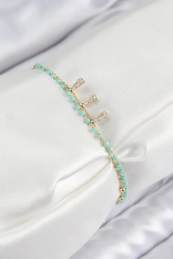 Pirinç Zirkon Taşlı Mavi Boncuklu Model Gold Renk Kadın Bileklik